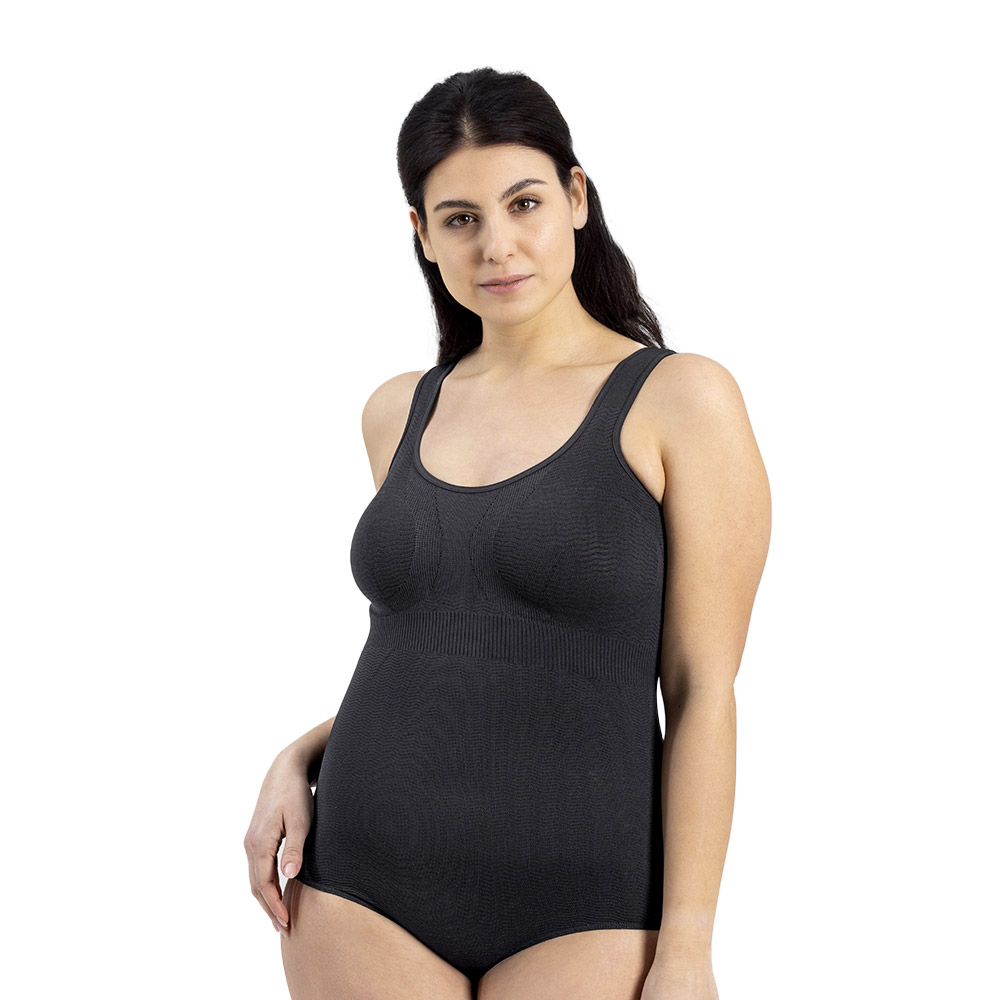 A woman wearing the Silver Wave Body Skin bodysuit in Nero